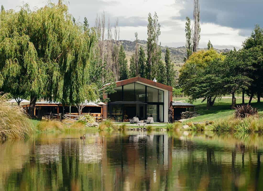 Cloudy Bay Shed on far shore of a small lake