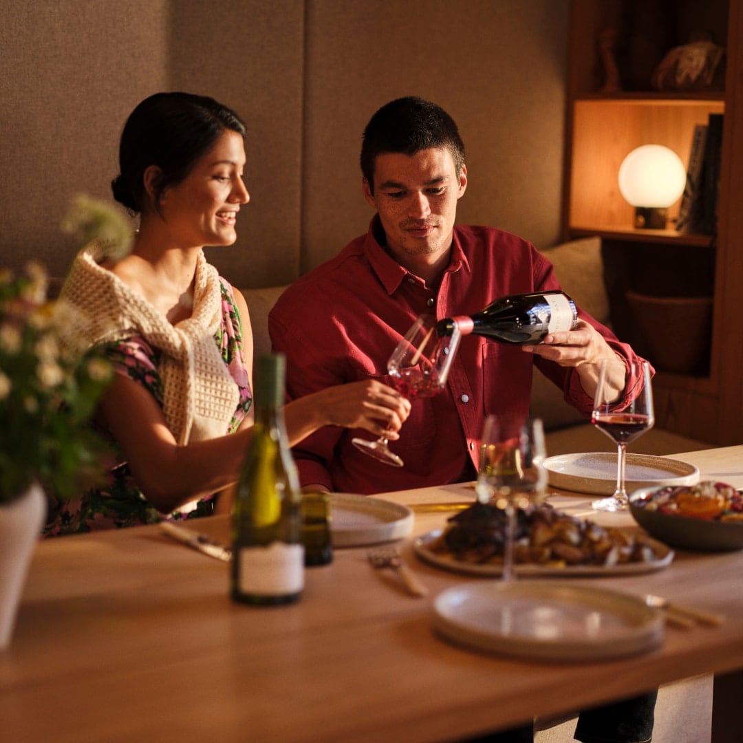 friends pouring wine