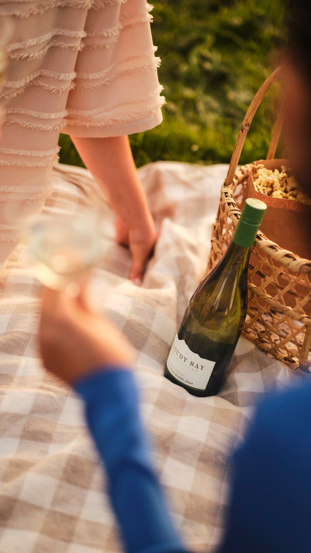 sauvignon blanc on picnic blanket
