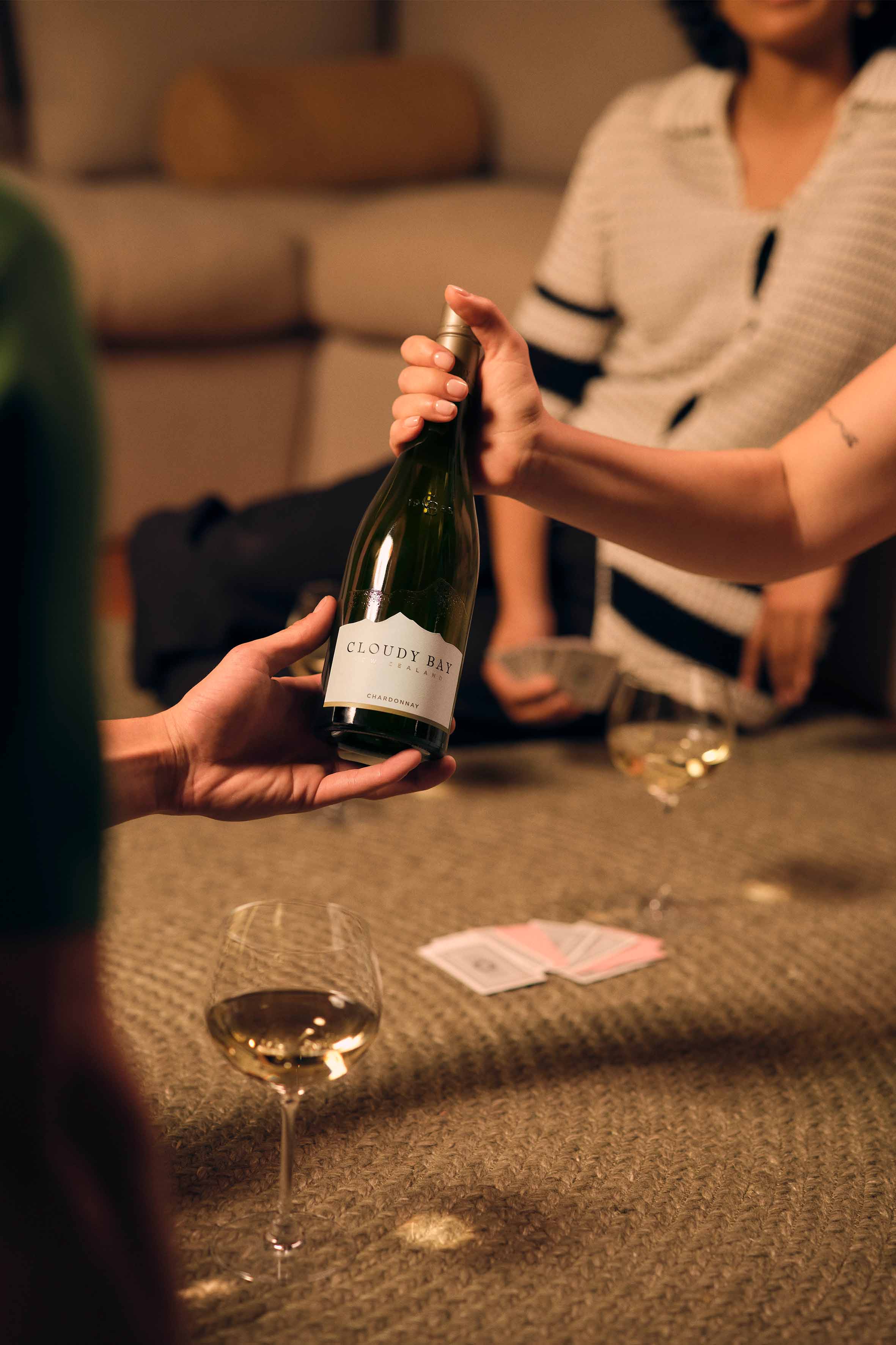 Games Night with a bottle of Cloudy Bay wine and friends