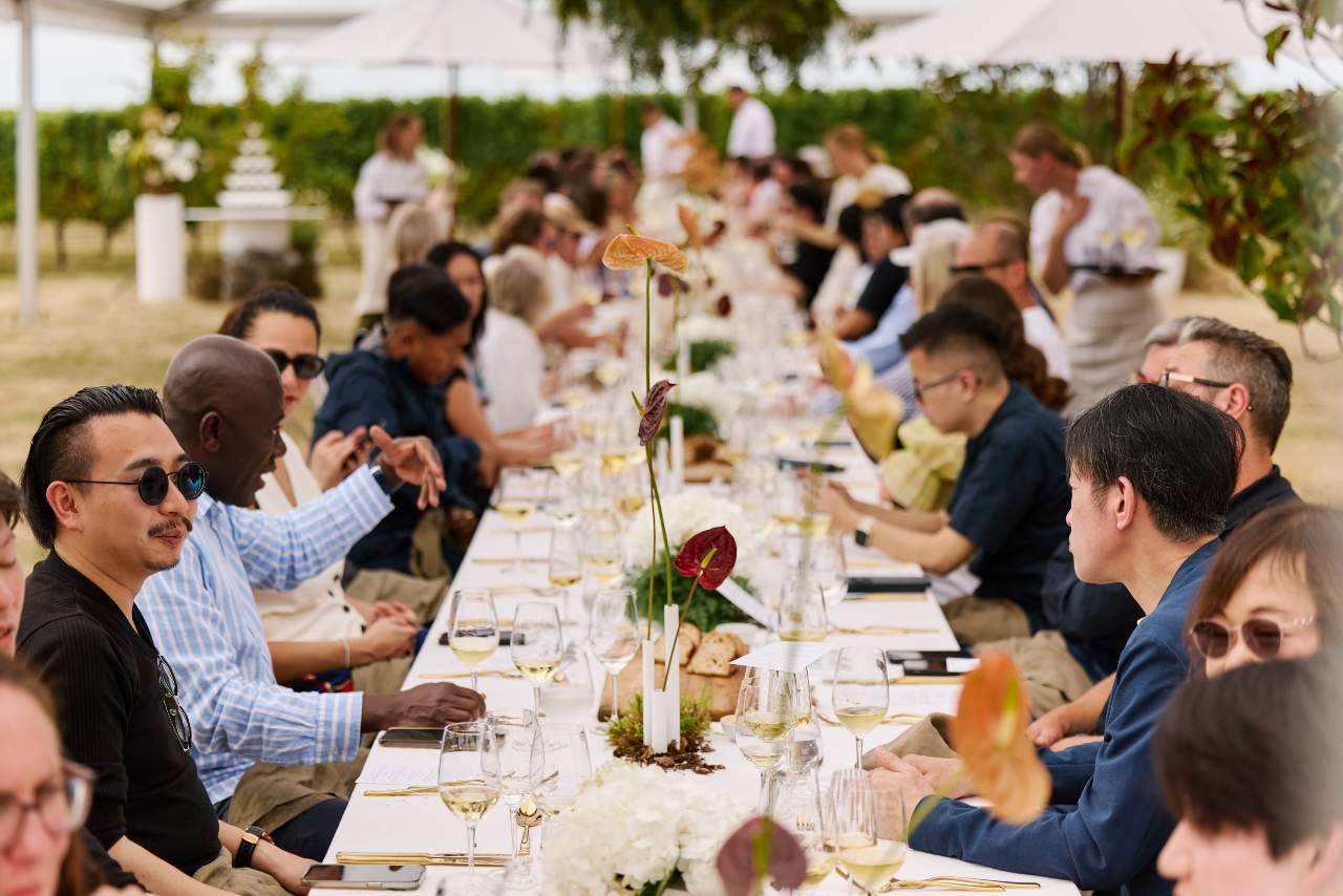 people enjoying food at table