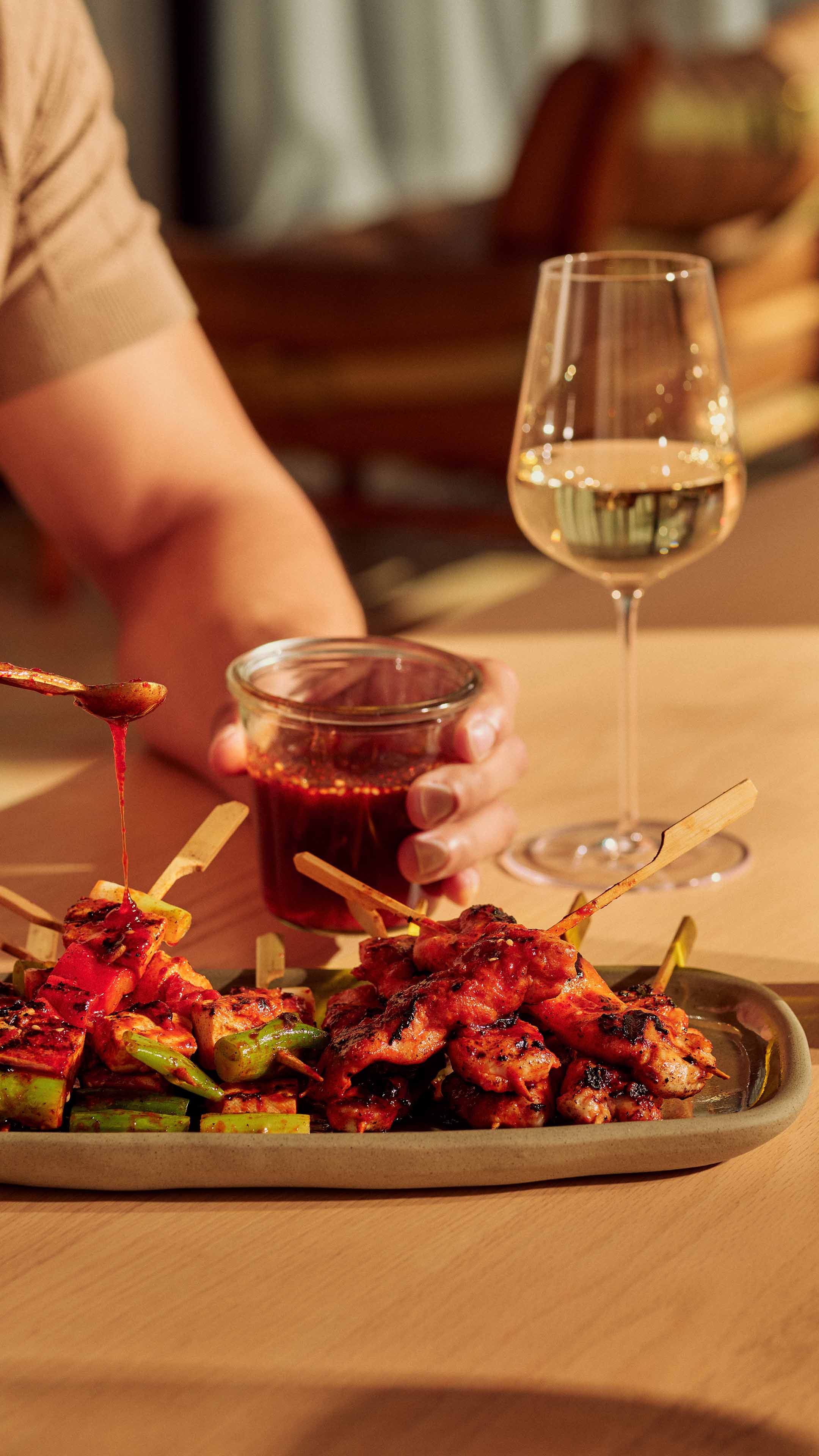 Hot honey dripping on skewers