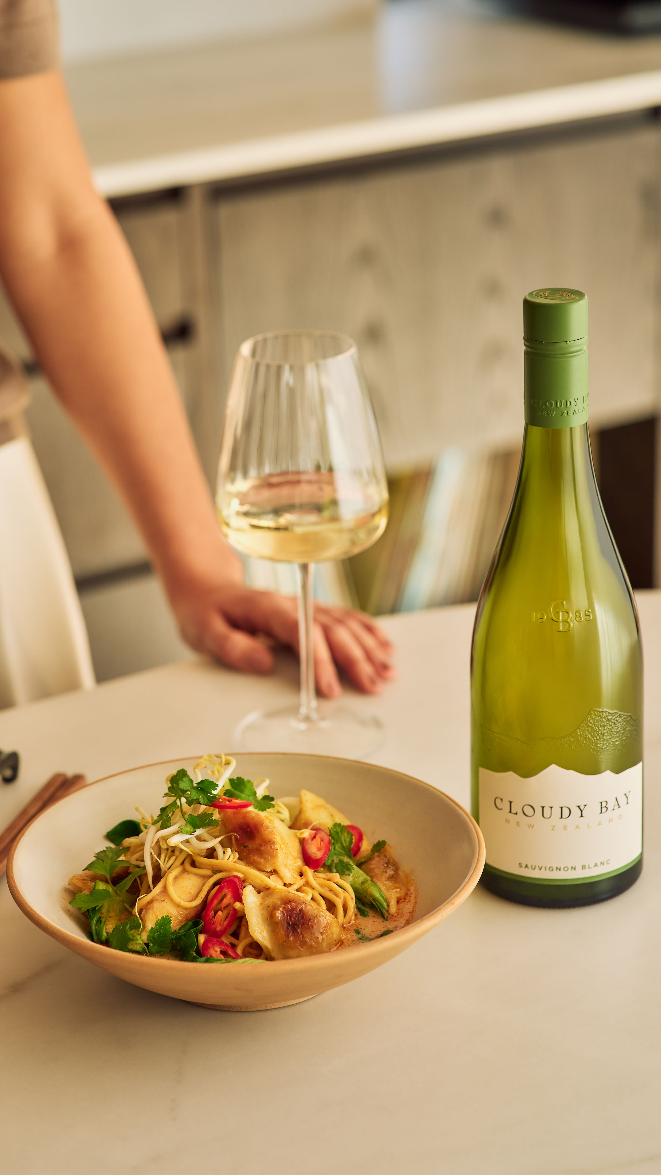 Close up Laksa Dumpling and Sauvignon Blanc