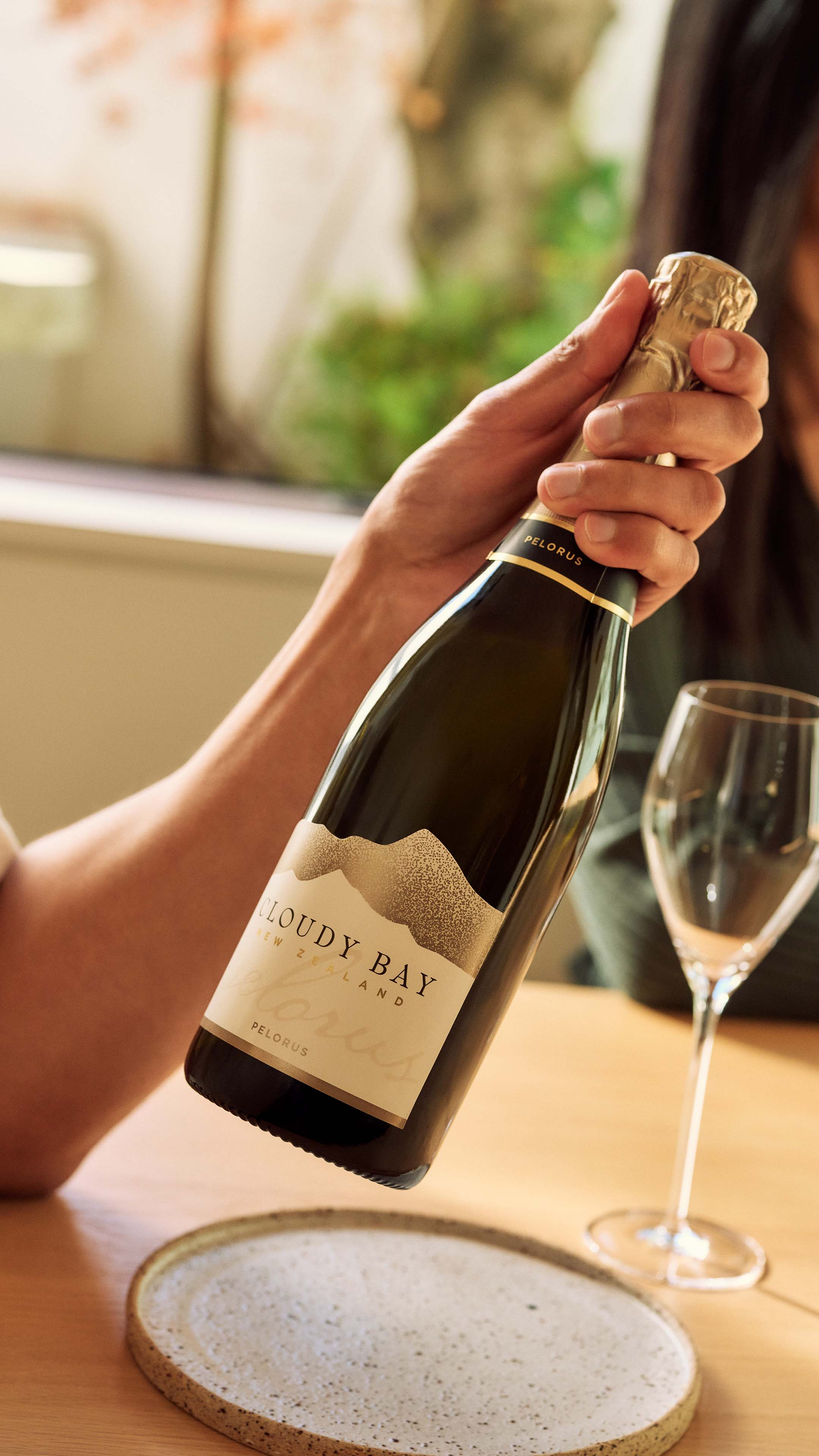 hand holding bottle of pelorus