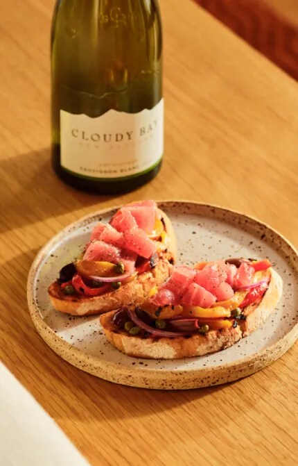 salted tuna bruschetta with charred capsicum and olives