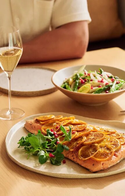 table-with-baked-salmon-salad-and-pelorus
